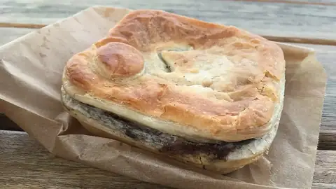 Meat pie in a paper bag